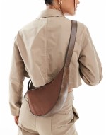 asymmetric scoop sling crossbody bag in brown