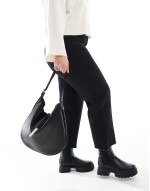 slouchy shoulder bag with clasp detail in black