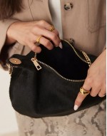 pony hair pouch clutch with gold hardware in black