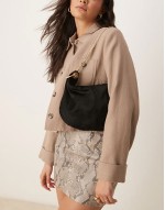 pony hair pouch clutch with gold hardware in black