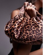 Giulia grab bag with ruche detail and twist handle in leopard